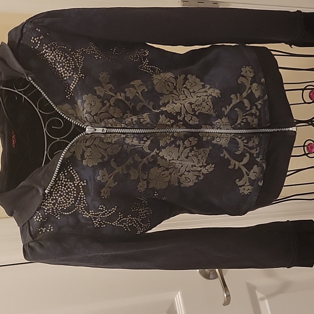 DKNY Sz Sm Black Hoodie w/blue & green flowers and a front zipper and rivits.